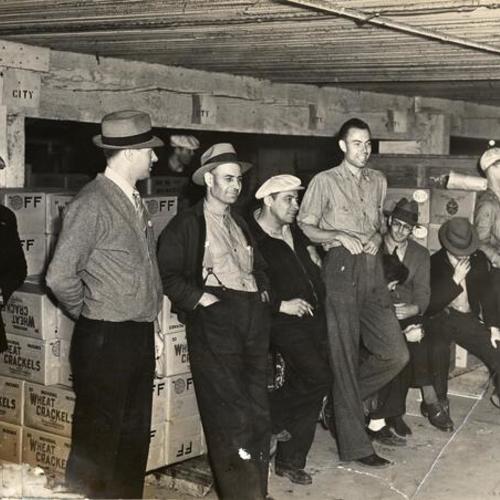 [Members of the Warehousemen's  Union in a warehouse on Third Street]