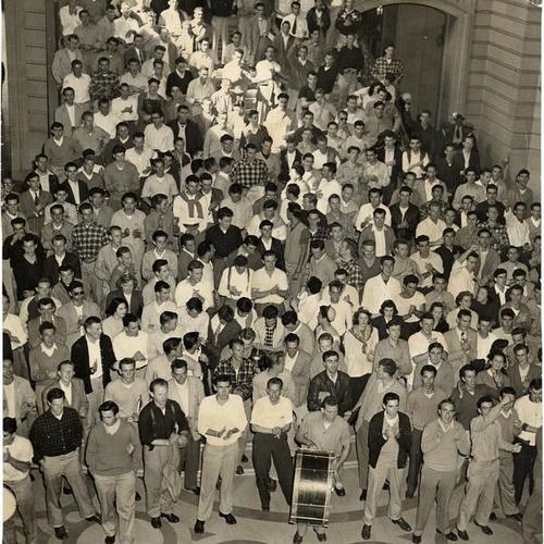 [University of San Francisco students holding a rally inside City Hall]