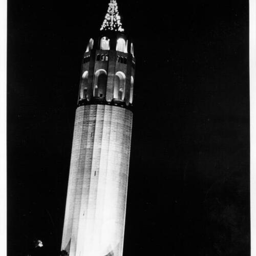 [Coit Tower at night]
