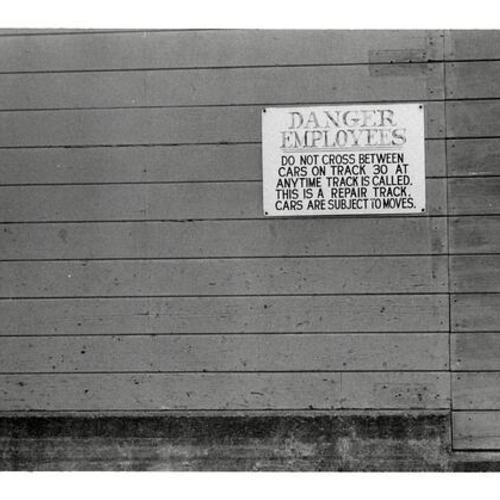 [Warning sign near Southern Pacific depot on 3rd Street]