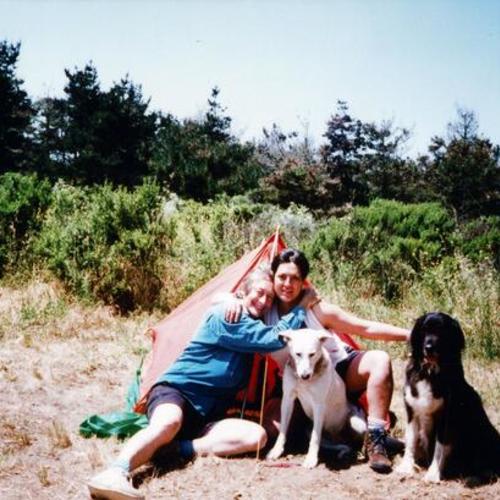 [A couple camping in California in 1996 with their dogs]