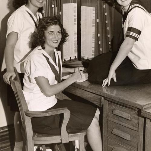 [Senior Camp Fire Girls Verna Dunham, Trudy Wulff and Dorothy Lauricella working on the San Francisco War Chest]