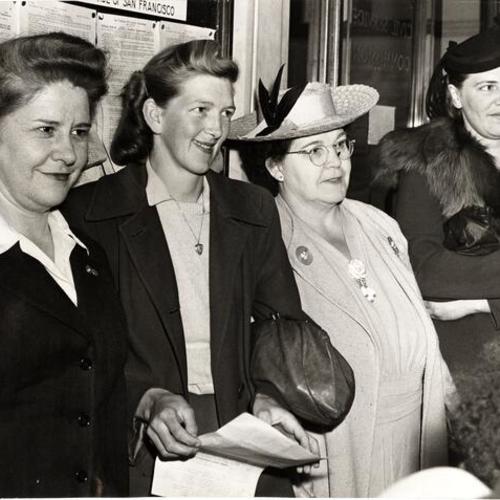 [Mary Lou Taylor, Connie Delury, Anna Gardner and Mary A. Cameron waiting to fill their applications for jobs at San Francisco Police Department]
