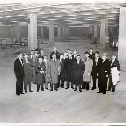 [Directors of the San Francisco Convention and Visitor Bureau inspecting the nearly completed Civic Center Exhibit Hall]