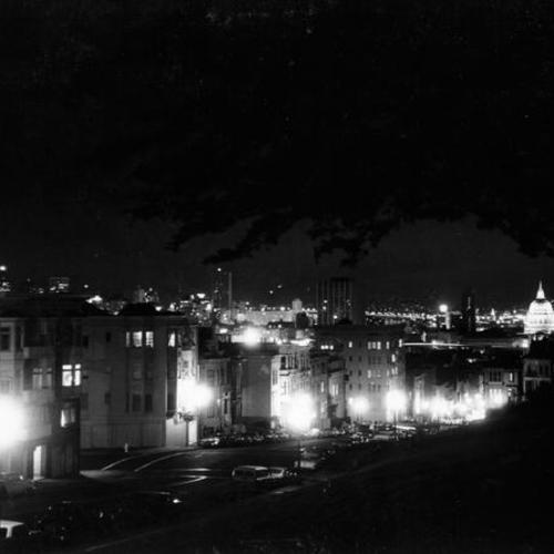 [Night view of Fulton street overlooking City Hall]