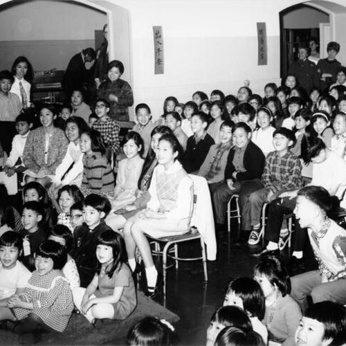 [Students watching a Chinese New Year program at Jean Parker School]