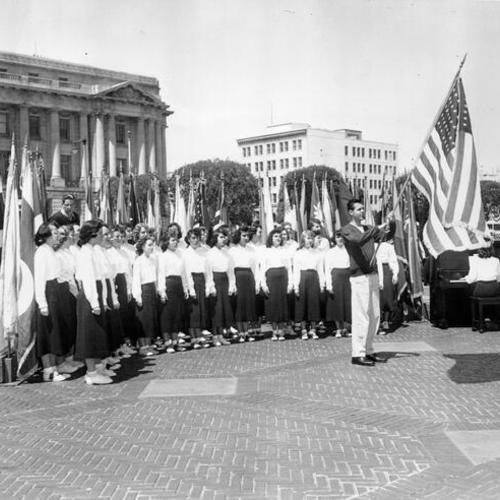 [St. Paulus Lutheran High School Glee Club performing flag pledge ceremony at Civic Center]
