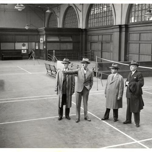 [Will F. Morrish, Joseph F. Marias, T. Louis Chess and Walter G. Swanson inspecting the upper floor of the Ferry Building]