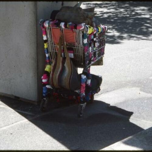 [Decorated shopping cart at Justin Herman Plaza]
