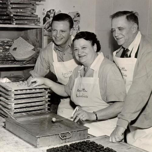 [John Rosenberg and his parents making candy at Rosita Candies, 127 Clement Street]