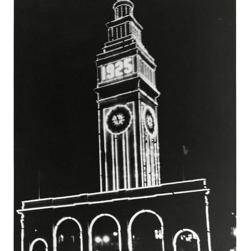 [Ferry Building at night with decorative lighting]