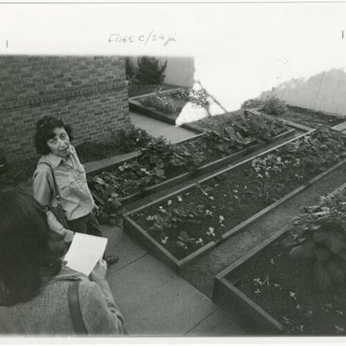 [Margaret Wyatt in the garden at the Noe Valley Branch of the San Francisco Public Library]