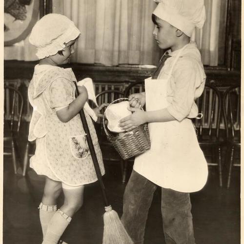 ['Bill the Baker' delivers the bread to 'Mrs. Penelope' at one of the Community Chest agencies]