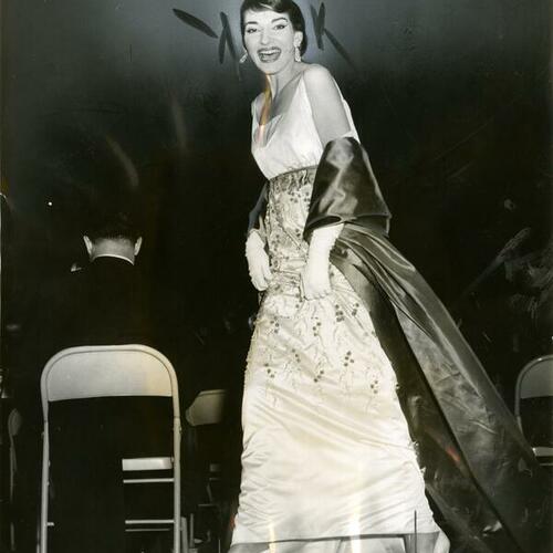[Maria Callas, on stage for curtain call]