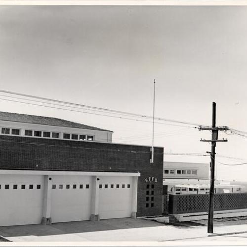 [Exterior of firehouse at 1935 32nd Avenue - Truck Company No. 18]