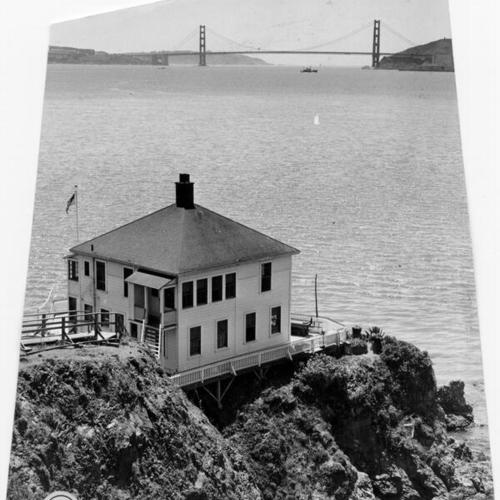 [Angel Island Coast Guard lighthouse with Golden Gate Bridge in background]