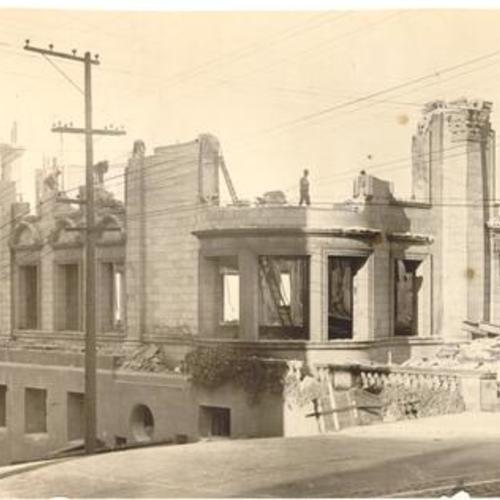 [Wrecking crew tearing down former residence of John D. Spreckels at Pacific Avenue and Laguna Street]