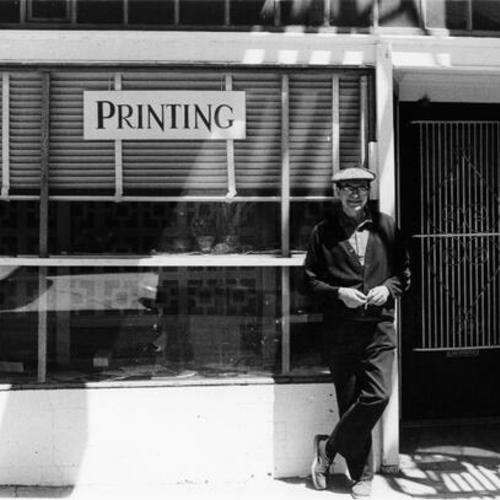 [Bob Hill standing in front of the Double H Press - north side Haight near Shrader]