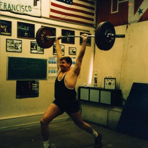 [John at the Olympic Weightlifting Championships held at the Sports Palace Gym]