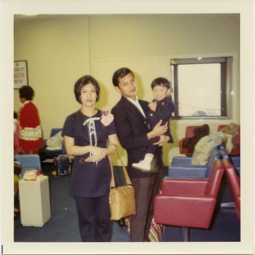 [A family leaving on a trip to the Philippines from San Francisco International Airport]