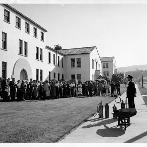 [Military and civilian personnel receiving a fire prevention orientation talk at the Presidio of San Francisco]