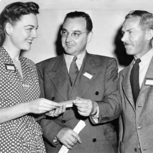[Edmund G. Brown being greeted by Patricia Robinson and Roger Walch]