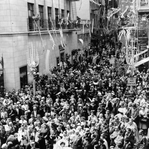 [Crowd of people on Maiden Lane for the annual Spring Festival]