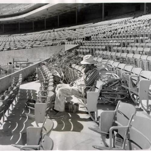 [Construction worker Joe Manzoni taking a break from the construction of Candlestick Park]
