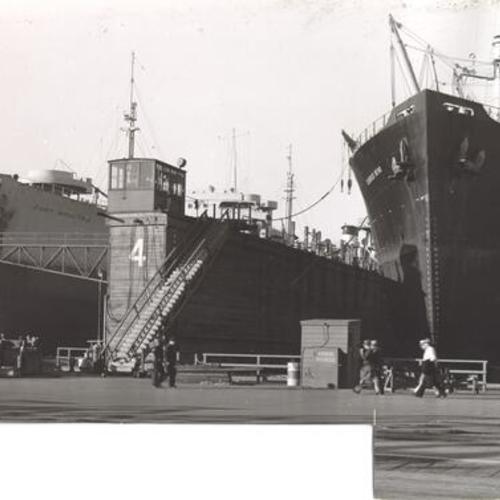 [Two ships being repaired at the Bethlehem-San Francisco Shipyard]