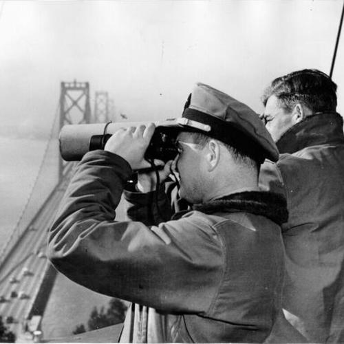 [Lieutenant John G. Worth, officer in charge of the Navy's Yerba Buena Island signal station, with Chief Signalman Stanley Jones]