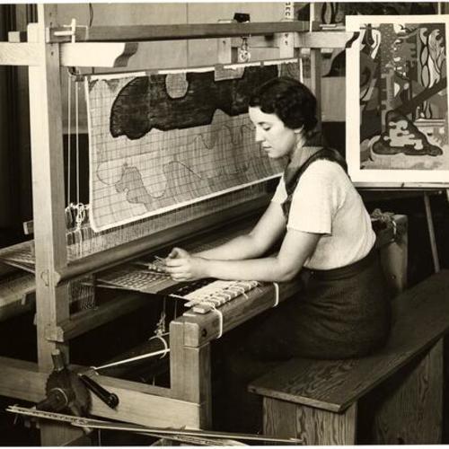 [Miss Maja Albee at work on the tapestry 'Forest Scene' by Hilaire Hiler]