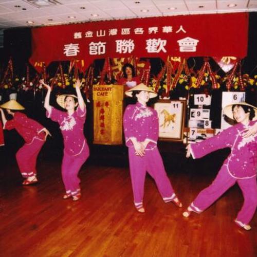 [A dance class performing The Pearl River side dance and Canton folk dance to celebrate Chinese New Year]
