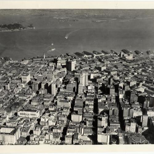 [Aerial view of downtown San Francisco and waterfront]