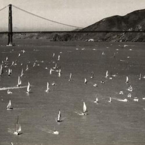 [Aerial view of sailboats on the bay]