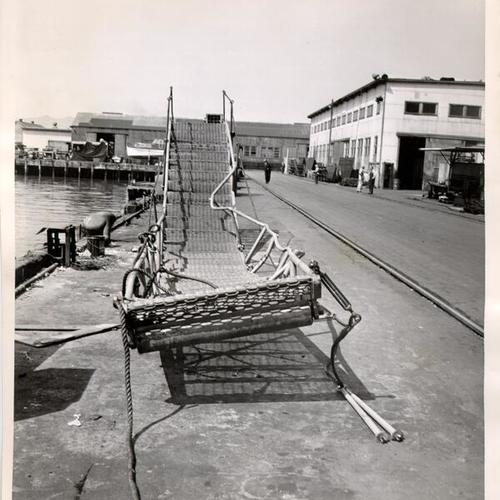 [Damaged gangplank on a pier at the San Francisco waterfront]