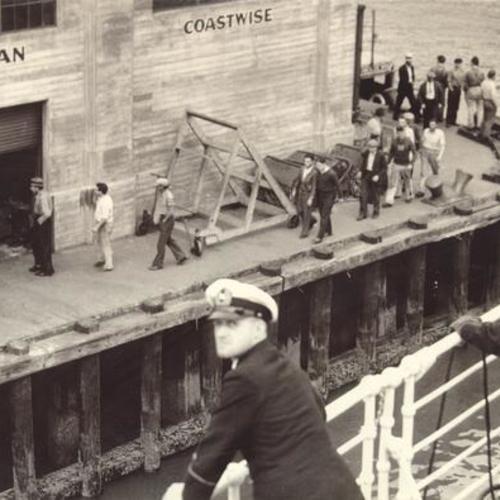 [Navy personnel at dock during waterfront strike]