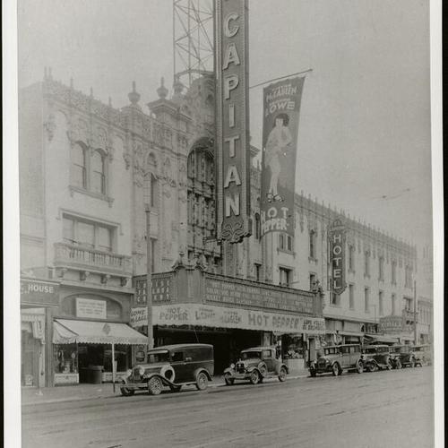 [Cars parked outside the El Capitan theater]