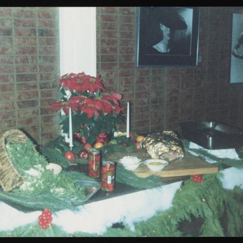 View of tabletop with holiday decorations and food