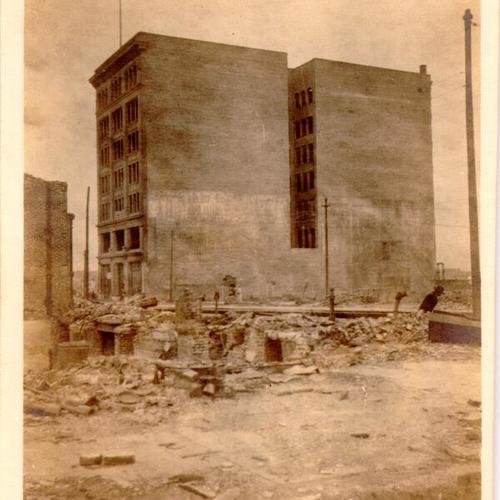 [California Casket Company building at 943 Mission Street, surrounded by ruins after the 1906 earthquake and fire]