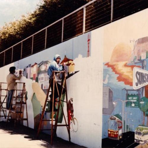 [Kenneth and Henry painting a mural at Ortega Library Branch retaining wall]