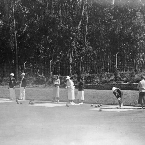 [People bowling at the bowling green in Golden Gate Park]