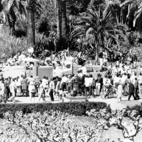 [Crowd gathers for "parade" during Golden Gate Park centennial celebration]