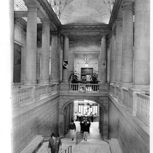 [View of staircase at the Main Library, looking down from the second floor]