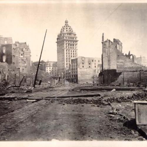 [Ruins in the vicinity of O'Farrell and Market streets, with Call Building in background]