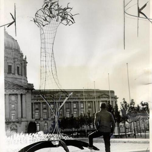[32-foot welded steel structure installed in a fountain in front of City Hall]