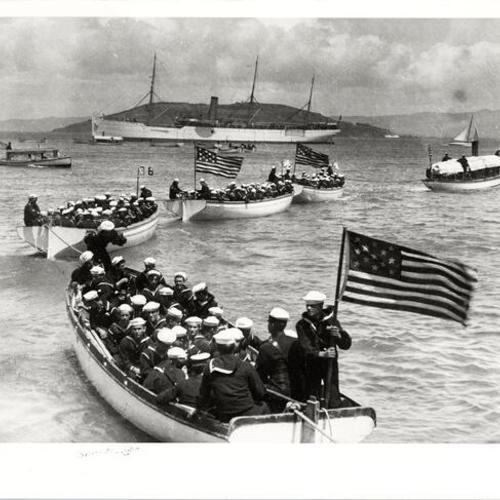[Sailors in Liberty Boats of the Great White Fleet with the storeship USS Culgoa in the background]