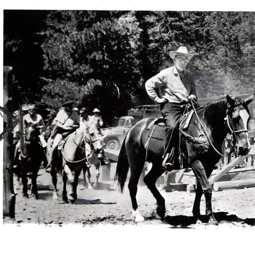 [Governor Edmund G. Brown on horse preapring to leave Kings Canyon National Park]