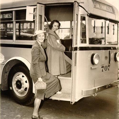 [Two women boarding a Muni bus]