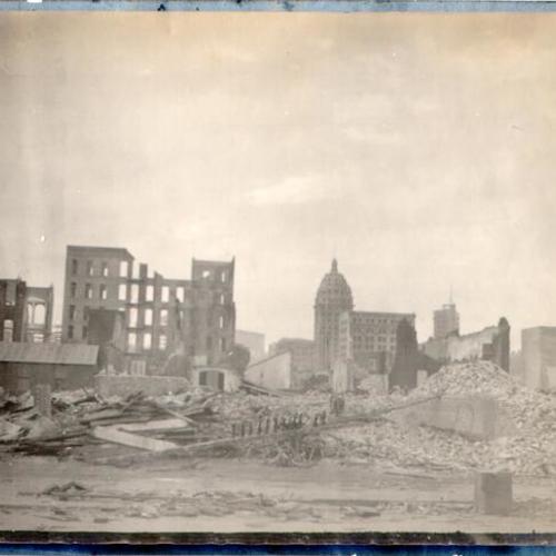 [View from Folsom Street, looking west, of damage caused by the earthquake and fire of 1906]