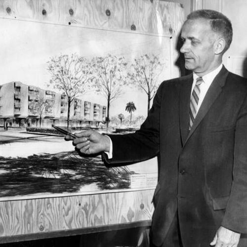 [Administrator Norman Thompson and Nursing Director Jean Tiesselinck looking at drawing of a planned new French Hospital]